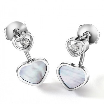 Boucles d'oreilles Chopard...