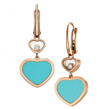 Boucles d'oreilles Chopard...